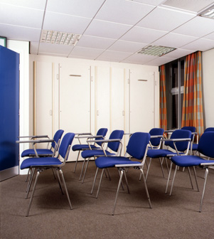 Euston Fire Station - Two 'Wiskaway'® 7500 Wallbeds folded away, with teaching chairs deployed